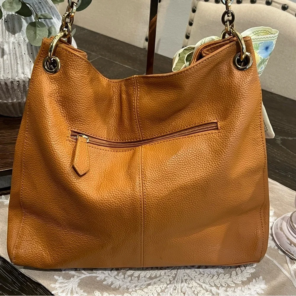 Elegant Currie & Pelle Tan Leather Handbag with Gold Accent